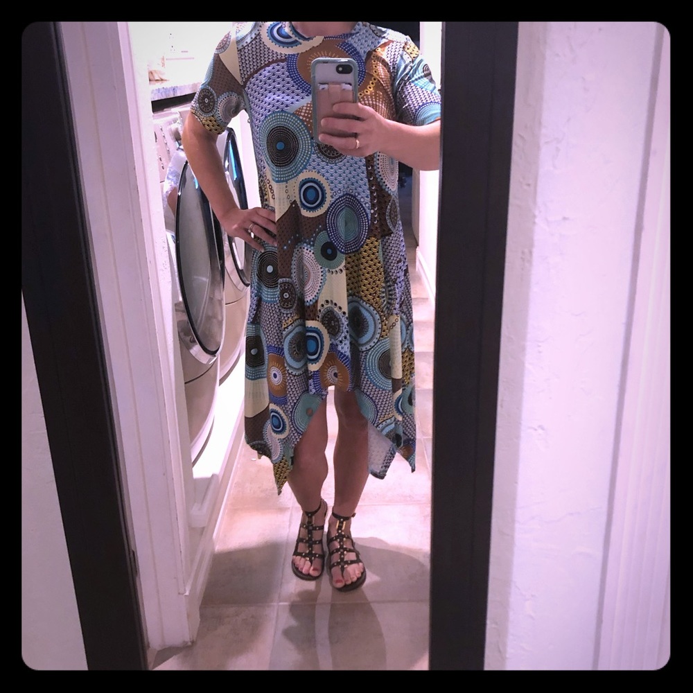 Capella Apparel boutique asymmetric hemline dress.